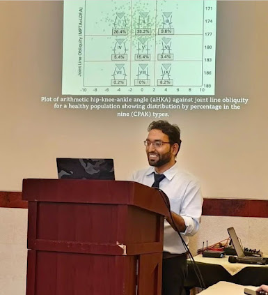 Orthopedic doctor delivering a medical presentation on joint analysis.